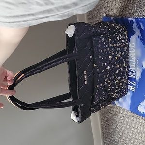 MZ Wallace black tote with metallic star motif